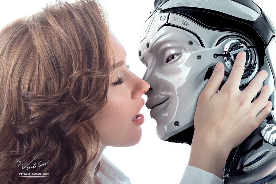 Красивая девушка целуется с роботом. A Beautiful girl kissing with a robot